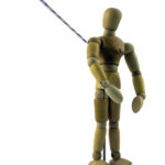A picture of a dummy with a rope attached to it showcasing a trajectory