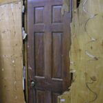 A wooden door that was discovered after wall board was removed during renovations