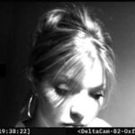 a picture of a woman captured through an ATM camera.