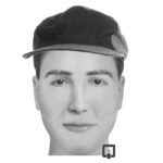 a monotone colored picture of a man wearing a hat