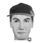 a monotone colored picture of a man wearing a hat