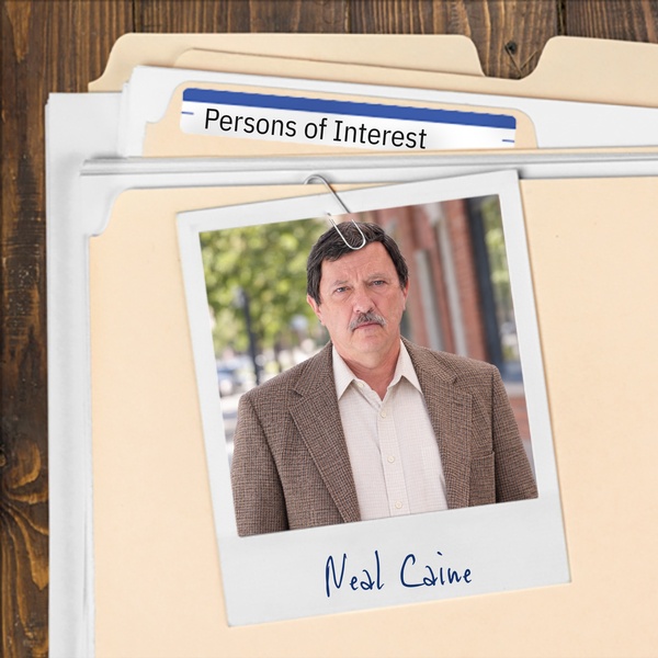 Manila folder with a photo of a man with dark hair and a salt-and-pepper mustache clipped to it