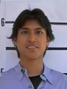 Man with medium length dark hair