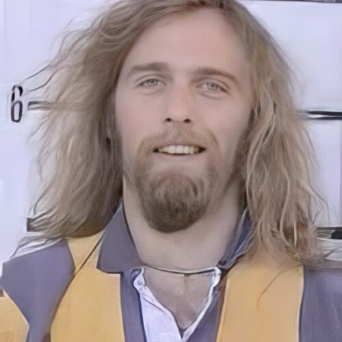 Man with long blond hair, beard and mustache