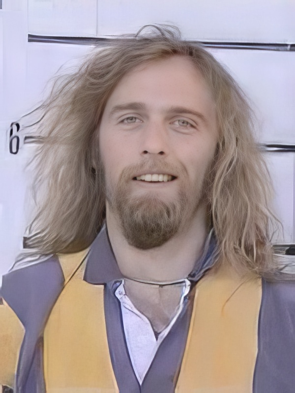 Man with long blond hair, beard and mustache