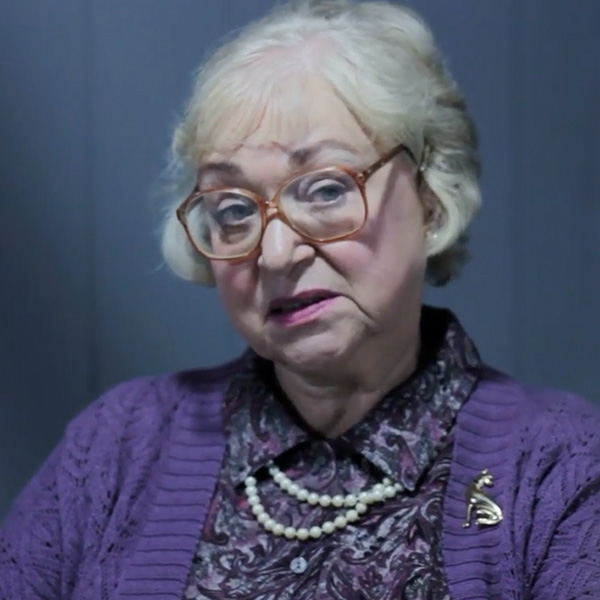 Older woman with short gray hair